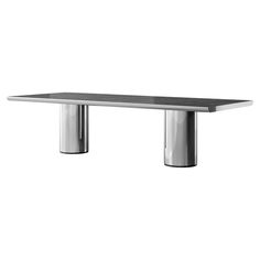 a stainless steel table with black marble top and two silver metal legs on the side