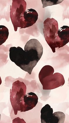 hearts painted in black and red on a pink background with watercolng effect to it