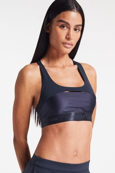 Mid impact sports bra All Motion fabric with new high shine Liquid Motion fabric Lightweight compression Wicking and quick-drying fabric 360-degree stretch Scoop neck with front cutout detail Racerback Under chest length BANDIER logo jacquard elastic waistband detail Form-fitting and true to size Imported 73% nylon, 27% spandex BND10262-Navy Blazer Addidas Bra, Hiit Training, Sport Logo, Nike React, Bag Icon, Navy Blazer, Photography Women, Sports Logo, Fit Inspo