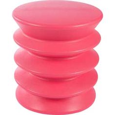 a stack of pink frisbees sitting on top of each other