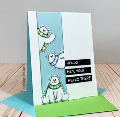 a card with two polar bears on it, and the words hello you are here