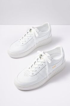 Hit your stride in these stylish Gola sneakers, finished in bright white leather with a platform sole and lace-up closure. Pair these sporty-chic low-tops with everything from denim and wide leg pants to a flowy dress. | GOLA Women's Grandslam Sneakers, Size 8, White Gola Sneakers, Fall Closet, Sparkle Shoes, Brand Style Guide, Shoe Size Conversion, Sporty Chic, Fall Shopping, Flowy Dress, Tee Dress