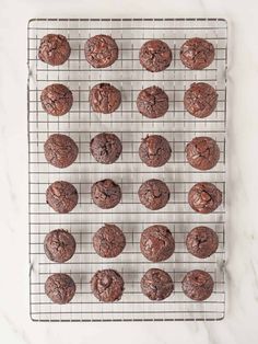 chocolate cookies on a cooling rack ready to go into the oven or baked in the oven