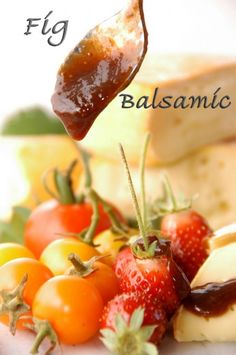 a spoon full of ketchup and some fruit on a plate with the words, fig balsamic