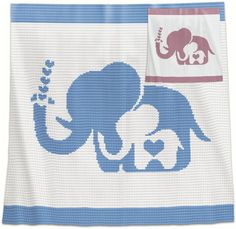 an elephant is depicted on a blue and white towel