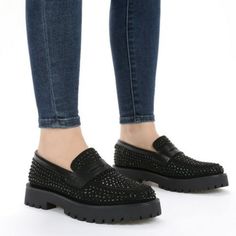 Jeweled Designer Loafers. Party Slip-on Loafers With Round Toe, Slip-on Round Toe Loafers For Party, Party Loafers With Slip-on Fit And Round Toe, Round Toe Loafers For Party In Fall, Black Platform Loafers For Party, Round Toe Loafers For Fall Party, Party Suede Flats With Round Toe, Black Slip-ons With Brogue Detailing And Flat Heel, Black Leather Slip-on Shoes With Studded Rubber Outsoles