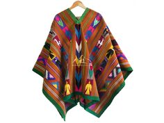 "Unique Peruvian Poncho forms intricate geometric patterns in natural colors. This traditional-style unisex poncho from Peru. It features stunning, intricately woven designs that date back to before the Inca empire, showcasing the skill of the weaver, which is passed down from generation to generation. Poncho unique, there is no other like it. Handmade on a loom. Traditional poncho from Ayacucho, Peru. Size: 65\" L x 58\" W - (165 x 145 cm)" Traditional Handmade Winter Cape, Traditional One-size Cape For Fall, Traditional One-size Fall Cape, Traditional One Size Cape For Fall, Traditional One-size Cape For Festivals, Traditional Brown Winter Cape, Handmade Artisan Poncho For Festivals, Traditional Woven Shawl For Fall, Traditional Shawl Poncho For Fall