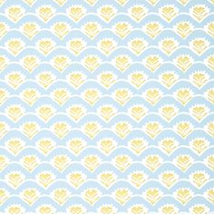 a blue and yellow wallpaper with hearts on it