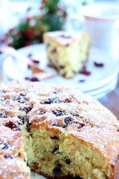 a close up of a piece of cake on a plate with a slice missing from it