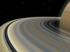 an artist's rendering of saturn with its rings in the foreground