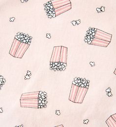 popcorn boxes and stars on pink cotton fabric