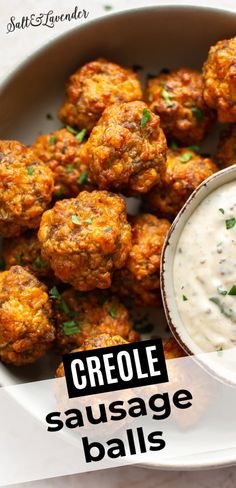 a white plate topped with meatballs covered in ranch dressing