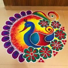 a colorful peacock is painted on the floor