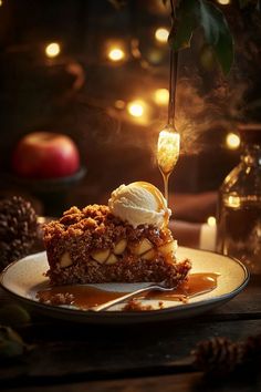 a piece of pie on a plate with ice cream and caramel syrup being drizzled over it