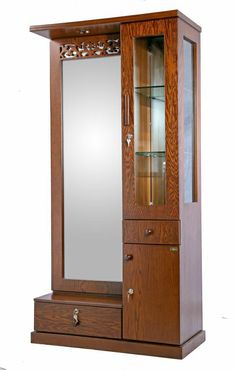 a wooden cabinet with mirror and drawers