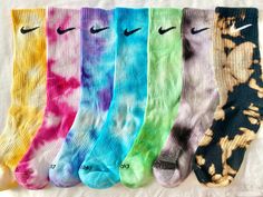 Beautiful Nike Tie-dye Socks Handmade in the UK. At Tie-dye by Rhi we have a large variety of styles and colours available, with each order being handmade to the highest quality. Available in; Size Small / UK Size 2-5 Size Medium / UK Size 5-8 Size Large / UK Size 8-11 Size XL / UK Size 11-14.5 With the quickest turn around possible we will get preparing your order as soon as payment has been received! Washing instructions - Wash socks with similar colours no higher than 30 degrees to keep the c Casual Multicolor Socks For Streetwear, Sock Tie Dye, Tye Dye Socks, Dyed Nike Socks, Nike Tie Dye Socks, Festival Tie-dye Hand Dyed Bottoms, Sporty Multicolor Cotton Socks, Tie Dye Socks, Nike Socks