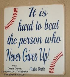 a sign on the wall that says it is hard to beat the person who never gives up