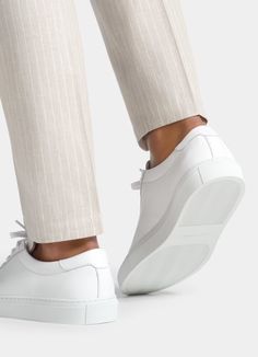 White Sneaker in Calf Leather | SUITSUPPLY US White Calf Leather High-top Sneakers With Contrast Sole, Calf Leather High-top Sneakers With Perforated Toe Box, Casual White Calf Leather Sneakers, White Casual Sneakers In Calf Leather, Classic White High-top Sneakers With Textured Sole, Classic White Sneakers With Textured Sole, White Leather High-top Sneakers With Textured Sole, Modern White Calf Leather High-top Sneakers, Modern Business Low-top Sneakers