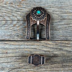 Copper western concho with a round shape. Decorated with a floral scalloped edge and a green turquoise center. All buckles will fit 5/8" to 3/4" wide leather Perfect for headstalls, breastcollars, dog collars, etc. Chicago screws are included Adjustable Turquoise Western Belt Buckles, Wither Strap, Bridle Bag, Beaded Dog Collar, Turquoise Western, Chicago Screws, Neon Flowers, Designer Dog Collars, Western Buckles