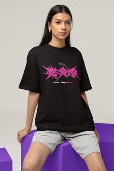 This Stray Kids tshirt celebrates the Rockstar album with the names of all of stay's favorite members on the back .: 100% Airlume combed and ringspun cotton (fiber content may vary for different colors) .: Light fabric (4.2 oz/yd² (142 g/m .: Retail fit .: Tear away label .: Runs true to size Rocker Short Sleeve T-shirt For Streetwear, Edgy Cotton Tops For Festival, Hip Hop Shirt With Graphic Design For Concerts, Rock Style Text Print T-shirt For Streetwear, Rock Style T-shirt With Letter Print And Short Sleeves, Rocker Crew Neck Tops For Fan Merchandise, Rocker Style Letter Print T-shirt For Streetwear, Rock Style Screen Print Short Sleeve T-shirt, Punk Style Screen Printed Tops For Festivals