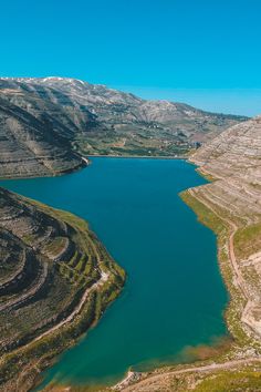 a large body of water surrounded by mountains