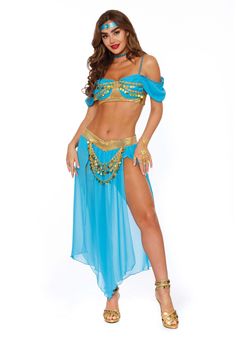 a woman in a blue belly dance outfit with gold accessories on her head and legs