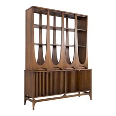 an art deco bookcase with wooden shelves