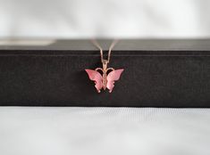 Silver Pink Butterfly Necklace🦋 Winter Special Gift Pack🎀 ✔Handmade silver butterfly necklace ✔925 sterling silver ✔Rose gold plated ✔Preserves its shine for a long time ✔Ready for shipping Material: 925 Sterling Silver Chain length: 45 cm You may choose it as a Christmas, anniversary, or birthday gift.🤍 If you have a question please don't hesitate to contact me.🌼 YOU MAY USE THE EXPRESS SHIPPING OPTION TO GET YOUR ORDER FASTER. Express shipping send by UPS, TNT, and FedEx. Delivery time: *E Pink Gold Jewelry With Clavicle Chain For Gift, Pink Gold Sterling Silver Necklace For Gift, Rose Gold Butterfly Charm Jewelry As Gift, Rose Gold Jewelry With Butterfly Charm As Gift, Pink Butterfly Charm Necklace For Gift, Dainty Pink Butterfly Necklace As A Gift, Dainty Pink Butterfly Necklace For Gift, Dainty Pink Butterfly Necklace As Gift, Fine Jewelry Butterfly Pendant Necklace