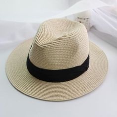 A Perfect Classic Panama Hat that you can carry everywhere you go, and especially in summer. This is perfect for you, under the sun. Two Colors : Please Select Your desired one. Product details: Size: 22.44 ''(57 cm) (head circumference) Material: Straw/Polyester