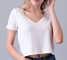 Solid, v-neck, short sleeve, crop top. 80% Rayon 15% Cotton 5% Spandex White V Neck Crop Top, Casual Fitted V-neck Cropped T-shirt, Trendy Fitted V-neck Top With Short Sleeves, Spring Trendy V-neck Cropped T-shirt, Trendy V-neck Cropped T-shirt For Summer, Casual V-neck Cropped T-shirt For Summer, Summer Cotton Cropped V-neck T-shirt, Everyday V-neck Crop Top, Stretch V-neck Crop Top For Everyday