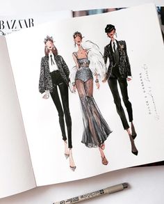 an open fashion book with pictures of women in clothes on the cover and texting below