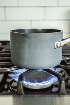 a pan sitting on top of a gas stove