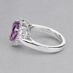 "Amethyst Ring, Halo Amethyst Heart Silver Ring, Natural Amethyst Ring for Women, February Birthstone Ring Flaunt yourself with this amethyst & white topaz halo ring. The natural gemstones have a combined weight of 3.53 carats and are set in .925 sterling silver with rhodium plating. The purple hue of this ring adds a pop of color to any look! The understated design and vibrant stones make this ring perfect for every occasion. amethyst halo silver ring, amethyst ring, amethyst silver ring, n Fine Jewelry Amethyst Ring With Vs Clarity, Oval Amethyst Ring With Cubic Zirconia And Gemstone Accents, Oval Amethyst Ring With Cubic Zirconia Accents, Purple Gemstone Heart Ring Fine Jewelry, Heart-shaped Amethyst Ring With Accent Stones, Fine Jewelry Amethyst Ring Heart Cut, Purple Heart-shaped Amethyst Promise Ring, Purple Oval Crystal Ring With Prong Setting, Fine Jewelry Heart Cut Amethyst Ring