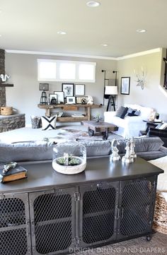 a living room filled with furniture and decor