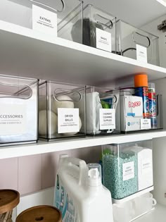 the shelves are organized with plastic containers and other items to keep things fresh in their bins