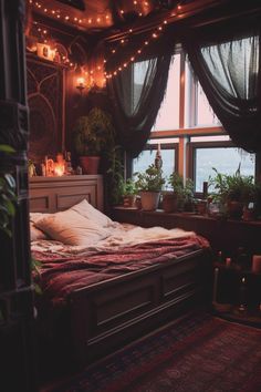 a bed sitting under a window next to a plant filled room with potted plants