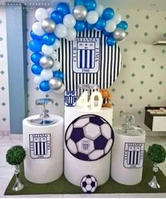 balloons and decorations for a soccer themed party