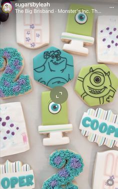 decorated cookies in the shape of letters and numbers