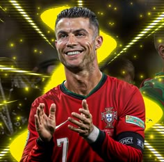 the soccer player is smiling and clapping his hands