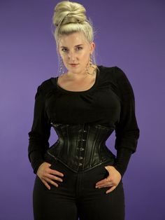 The CS-201 waspie steel boned plus size waist trainer combines a shorter profile with super cinching! This soft supple lambskin corset is easily our most comfortable style to wear. This short corset is so comfortable you may forget you have it on-except everyone will notice your fabulous cinched waist! Closed waist sizes 34-40. Smaller sizes available. We recommend that you wear something between yourself and the corset and lucky you, we have a bamboo liner that will do just that! Buy one or sav Steampunk Black Underbust Corset Belt, Gothic Overbust Corset Belt With Medium Bust Support, Black Underbust Corset Belt With Boned Bodice, Gothic Black Corset With Medium Bust Support, Orchard Corset, Plus Size Leather, Plus Size Gothic, Black Leather Corset, Corset Training