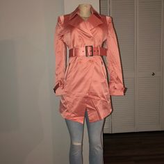 New Peach Colored Woman’s Trench Coat. 4 Front Buttons. 2 Front Pockets. Belt Included. Size Medium Pictured Elegant Orange Spring Outerwear, Chic Fitted Orange Outerwear, Casual Pink Outerwear For Party, Peach Long Sleeve Spring Outerwear, Spring Peach Outerwear, Fitted Belted Pink Outerwear, Chic Pink Outerwear For Brunch, Mackage Coat, Plaid Trench Coat