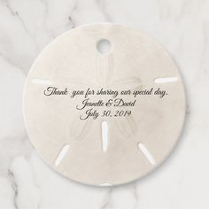 a white sand dollar with the words thank you for sharing an special day on it