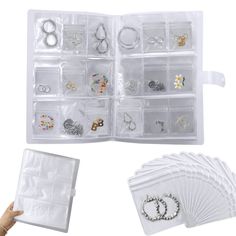 an assortment of jewelry and rings in a clear plastic storage case with white dividers