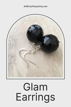 These handcrafted black onyx earrings are simply stunning! Silver fish hooks featuring a large 18mm round faceted black onyx gemstone and measuring 1.5 inches in length. Perfect for any formal occasion! Black Dangle Plug Earrings As Gift, Black Dangle Plug Earrings For Gift, Black Dangle Plug Earrings Nickel Free, Nickel-free Black Dangle Plug Earrings, Nickel-free Black Earrings For Party, Black Nickel-free Earrings For Party, Black Nickel-free Dangle Plug Earrings, Black Adjustable Jewelry With Ear Wire, Adjustable Black Jewelry With Ear Wire