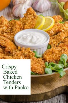 crispy baked chicken tenders with panko and ranch dressing on a platter