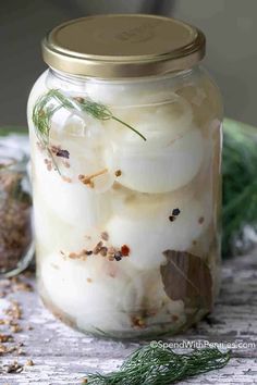 a jar filled with food sitting on top of a table