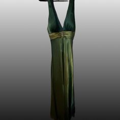 Open Back Formal Green Silk Midi Dress, Green Fitted Maxi Dress For Formal Occasions, Green Spring Evening Dress For Dinner, Spring Green Evening Dress For Dinner, Green V-neck Midi Dress For Gala, Formal Holiday Green Maxi Dress, Green Summer Evening Dress For Dinner, Green Evening Dress For Dinner, Elegant Green Holiday Midi Dress