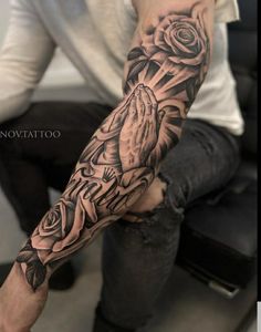 a man with a tattoo on his arm