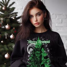 🦇 Merry Krampus spooky sweatshirt - Christmas T-shirt or cosy sweatshirt with demonic  evil Santa - Krampus is waiting for you! Perfect for lovers of creepy Christmas sweatshirts and t-shirts, gothic clothing fans and all the spooky ghouls!🦇 Stay CREEPY, Stay WILD! 🎨🖌️ ** All of the designs are my original artworks ** If you like the design but whant to make it more custom or you have something specific in mind just reach out to me and I'm happy to create something special for you! 👕 SWEATSHIRT DETAILS :  -> Unisex classic fit -> Heavy Blend (8 oz / 271 g) -> Mix of 50% US cotton and 50% polyester -> Ribbed knit collar with seam -> Without side seams 📏 SWEATSHIRT SIZE CHART: (Inches) S -> 27" body length x 20" body width M -> 28" body length x 22" body width L -> 29" body length x 24 Evil Santa, Merry Krampus, Horror Christmas, Spooky Sweatshirt, Cute Christmas Sweater, Xmas Jumpers, Creepy Christmas, Sweatshirt Details, Spooky Cute