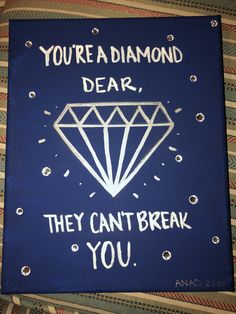 a sign that says you're a diamond dear, they can't break you